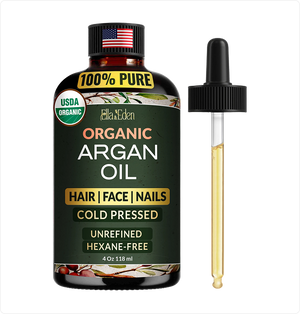 Bottle of Organic Argan Oil with dropper on a white background