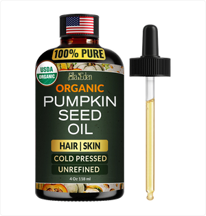 Bottle of Ella Eden Organic Pumpkin Seed Oil with a dropper on a white background